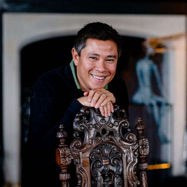 Portrait of sculpture curator Nick Crocker in Helmingham's Great Hall