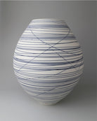 Large porcelain oval vase with blue lines by Ali Tomlin