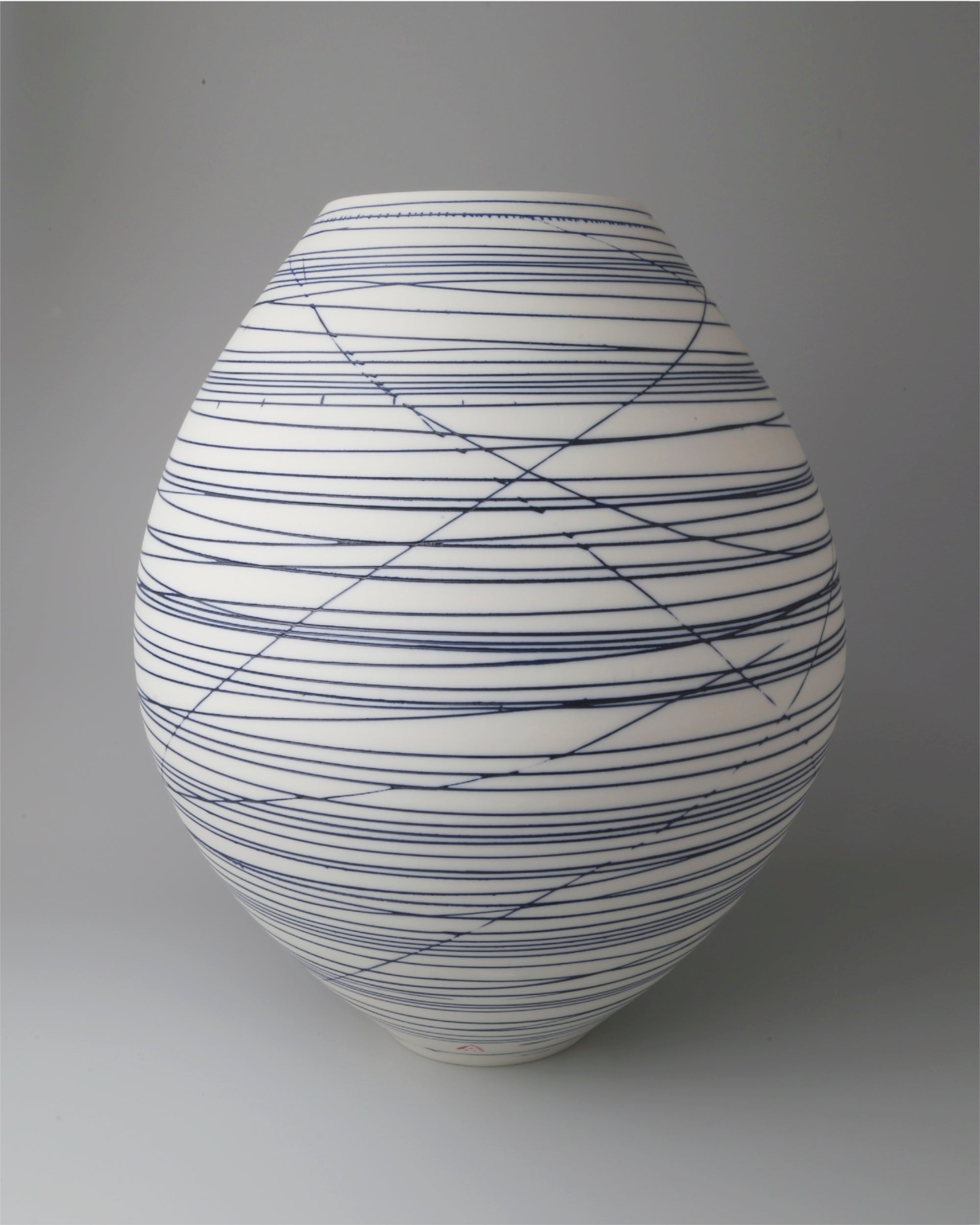 Large porcelain oval vase with blue lines by Ali Tomlin