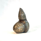 Bronze resin sculpture of a bird on an acorn by Caro Burberry.