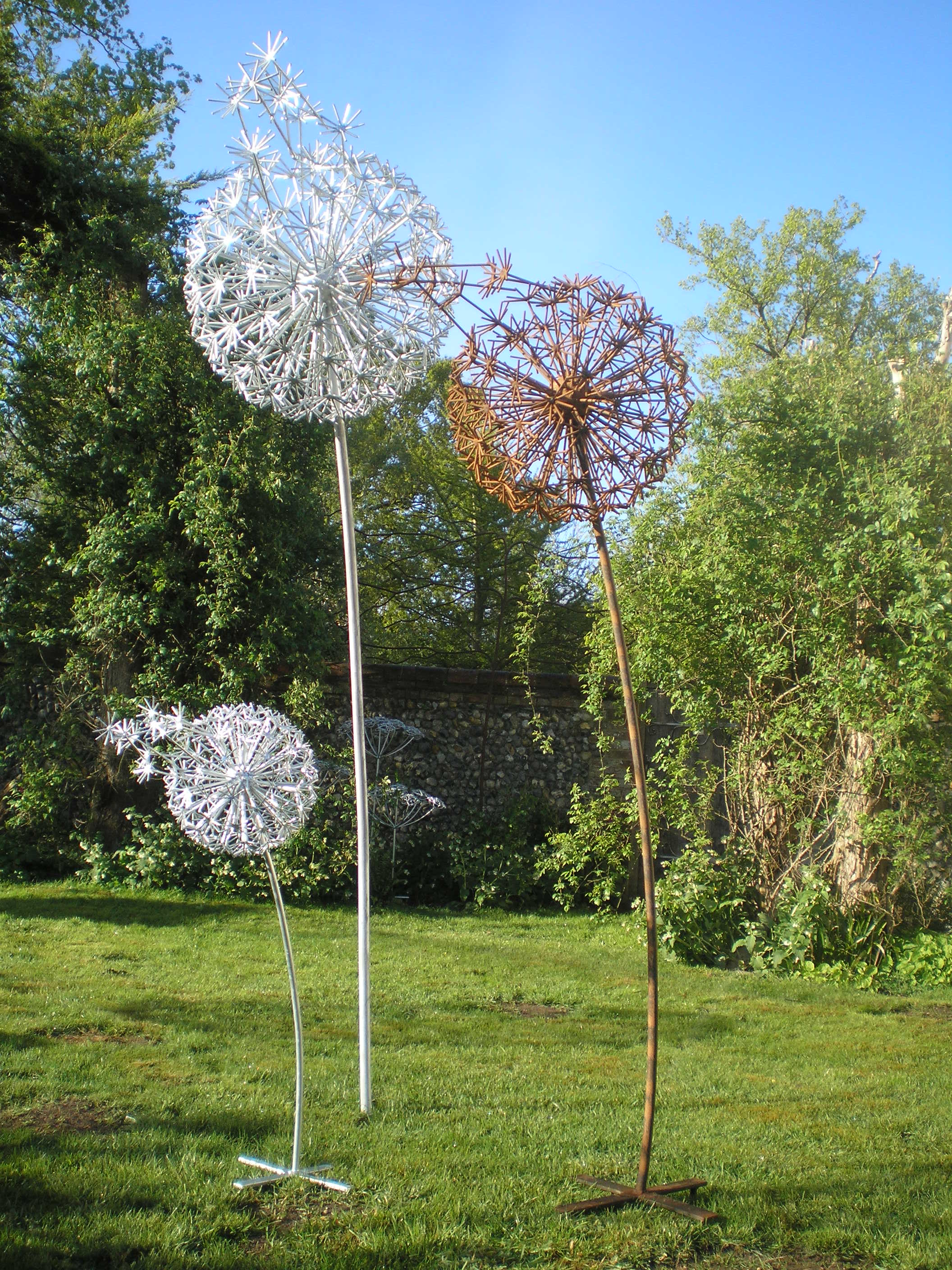 Steel garden sculptures of dandelion clocks by Designs on Metal
