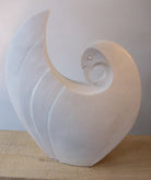White marble sculpture of dove bird by Paul Harvey
