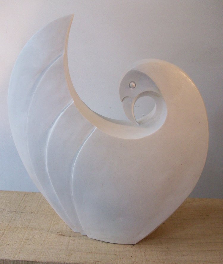 White marble sculpture of dove bird by Paul Harvey