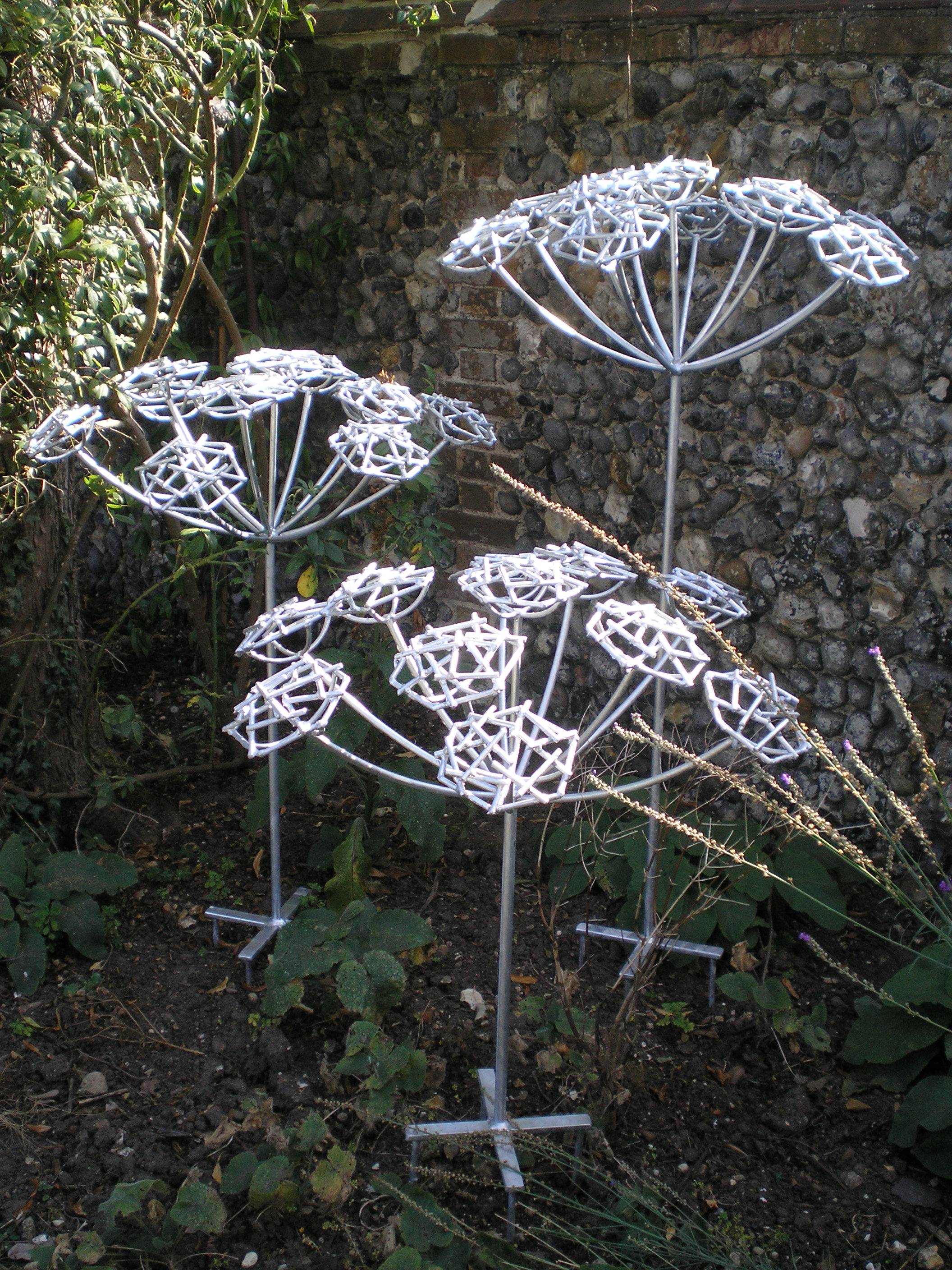 Steel garden sculpture of hemlock plant by Designs on Metal