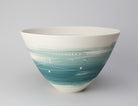 Tall porcelain bowl in white with blue wash over outside edge by Ali Tomlin