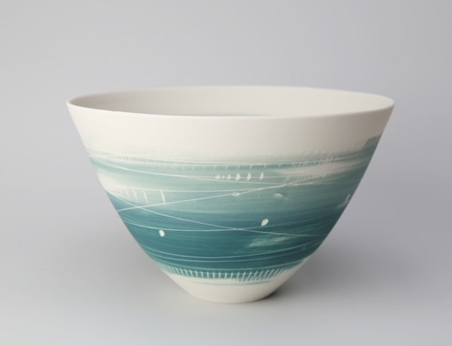 Tall porcelain bowl in white with blue wash over outside edge by Ali Tomlin