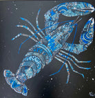 Blue collaged lobster on a black background by Nicola Hart